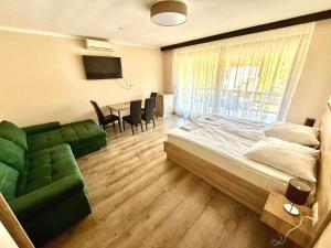 Posteľ alebo postele v izbe v ubytovaní See Vendégház - Siófok