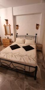 Katil atau katil-katil dalam bilik di Samos Paradise Studios and Apartments 1