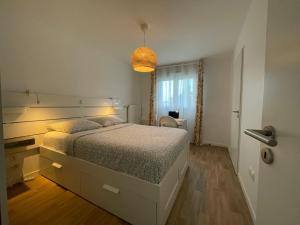 a bedroom with a large bed in a room at Apartment near to Paris CDG in Aulnay-sous-Bois
