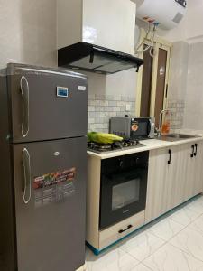 Η κουζίνα ή μικρή κουζίνα στο 1 Bedroom Dakar, SYLKO Residence