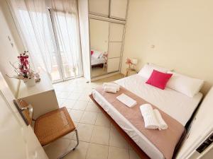 Ένα ή περισσότερα κρεβάτια σε δωμάτιο στο Thassos Sea View Apartment