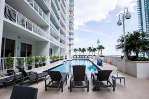 a swimming pool in the middle of a building at Exclusive 2BR APT Brickell Free Parking in Miami