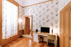 TV a/nebo společenská místnost v ubytování Santa Rosa Relais