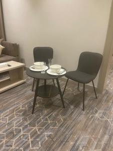 Posezení v ubytování الإقامة الذهبية للشقق المخدومة Golden Residence Hotel