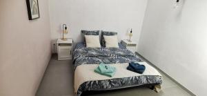 Postel nebo postele na pokoji v ubytování Gîte de Riosset