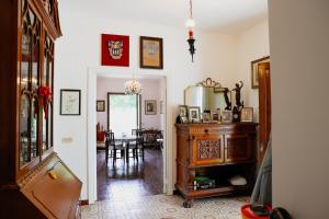 a hallway with a dining room and a dining table at Villa Pina in Priverno +40 photos