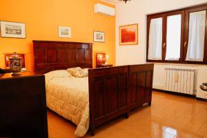 Postel nebo postele na pokoji v ubytování Villa Pina