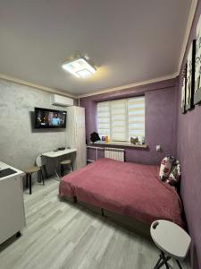 TV a/nebo společenská místnost v ubytování Апартаменты Компания Феникс