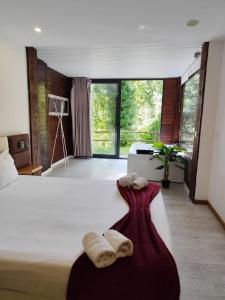 Postel nebo postele na pokoji v ubytování Dobau casas + 37 fotografií