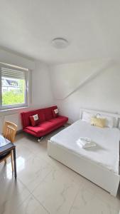 Postel nebo postele na pokoji v ubytování Bookly Apartments