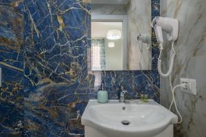 Koupelna v ubytování Sa Domu Colorada- Eleganza e comfort nel centro di Villasimius