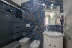 Koupelna v ubytování Sa Domu Colorada- Eleganza e comfort nel centro di Villasimius
