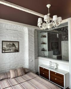 Ένα ή περισσότερα κρεβάτια σε δωμάτιο στο VIP apartments 40