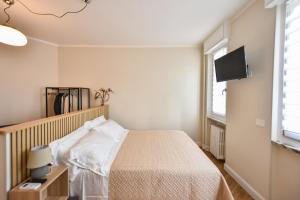 Postel nebo postele na pokoji v ubytování Lingotto Rooms