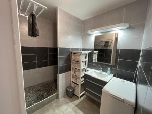 Koupelna v ubytování Gwad'ACTE