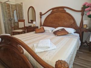 Postel nebo postele na pokoji v ubytování Giovanna Boutique Rooms & Pool