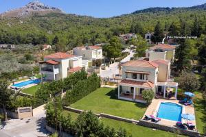 Πισίνα στο ή κοντά στο Villa Olympios Springs by Villa Plus