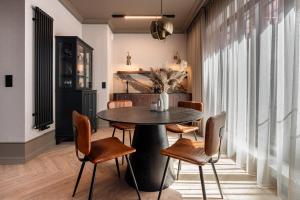 Posedenie v ubytovaní Lavoo Boutique Apartments