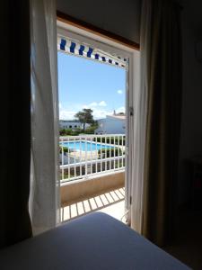 A balcony or terrace at Hostal Port Fornells