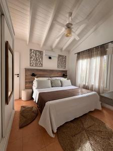 Postel nebo postele na pokoji v ubytování Runa Moraira Apart & Spa