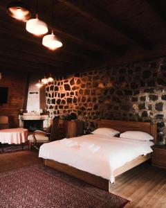 Postel nebo postele na pokoji v ubytování Bianca Hotel & Villa + 37 fotografií