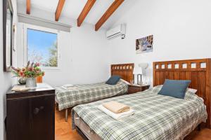 En eller flere senge i et værelse på Villa Cas Sucrer by Villa Plus + 14 billeder