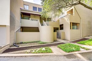 an apartment building with a staircase in front of it at Pool and Trail Access On-Site Barton Creek Condo! in Austin