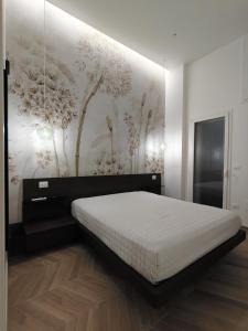 Ένα ή περισσότερα κρεβάτια σε δωμάτιο στο La casa dei sogni