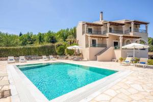 The swimming pool at or close to Villa Nafsika