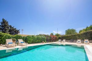 The swimming pool at or close to Villa Nafsika