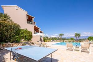 The swimming pool at or close to Villa Nafsika