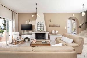A television and/or entertainment centre at Villa Nafsika