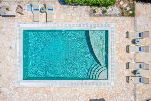 The swimming pool at or close to Villa Nafsika