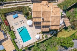 The swimming pool at or close to Villa Nafsika