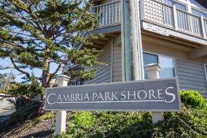 a sign in front of a building at Cambria Park Shores in Cambria