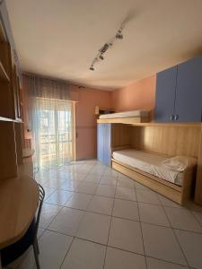 Ένα ή περισσότερα κρεβάτια σε δωμάτιο στο Salsedine & Sole