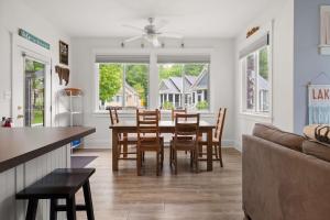 a kitchen and dining room with a table and chairs at The Tamarack - 11 Hollow in Cherry Valley
