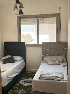 Postel nebo postele na pokoji v ubytování Appart luxe