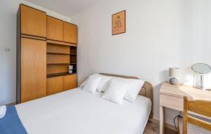 Postel nebo postele na pokoji v ubytování Kuća za odmor "Dida Pere"