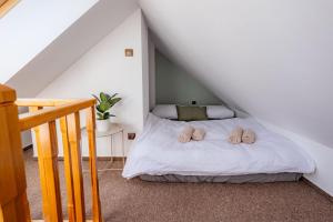 Voodi või voodid majutusasutuse Apartmán U Soviček toas