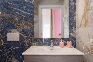 Koupelna v ubytování Sa Domu Colorada- Eleganza e comfort nel centro di Villasimius