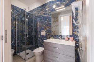 Koupelna v ubytování Sa Domu Colorada- Eleganza e comfort nel centro di Villasimius