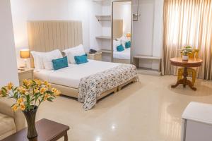 Postel nebo postele na pokoji v ubytování Hotel Costa Bonita