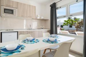 Kuchnia lub aneks kuchenny w obiekcie Apartamentos Santa Rosa
