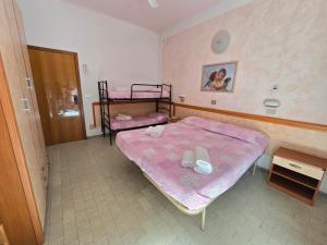 Postel nebo postele na pokoji v ubytování Hotel Rosa