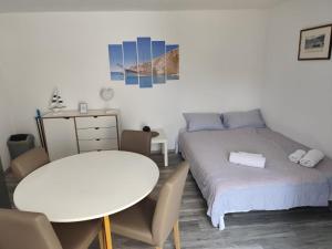 Postel nebo postele na pokoji v ubytování Apartments Borić