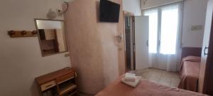TV a/nebo společenská místnost v ubytování Hotel Rosa