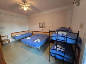 Postel nebo postele na pokoji v ubytování Hotel Rosa