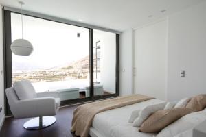 Posteľ alebo postele v izbe v ubytovaní Altea Hills Luxury Villas + 34 fotografií