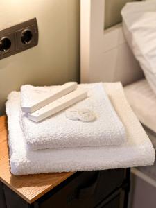 Postel nebo postele na pokoji v ubytování Tiroents Hotel